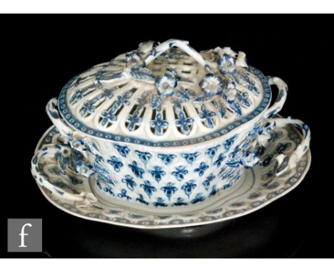 A late 18th Century Worcester chestnut basket and stand decorated in the underglaze Pine Cone pattern, the basket of lobed sh