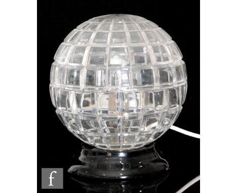 A later 20th Century Riedel spherical table lamp, the clear crystal in two halves and mitre cut with lines of longitude and l