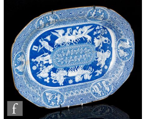 A large 19th Century blue and white meat plate or well and tree carving dish decorated in the transfer printed Greek pattern 