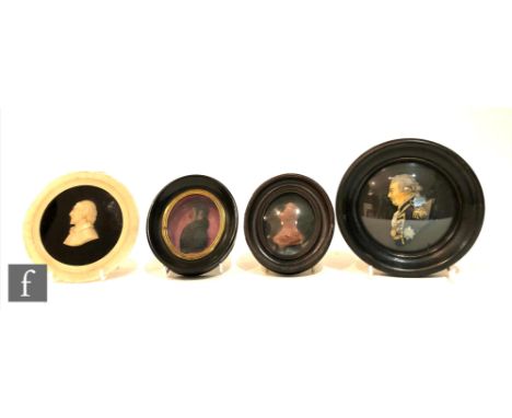 A 19th Century carved alabaster profile portrait of William Shakespeare, in circular turned alabaster frame, diameter 12.5cm,