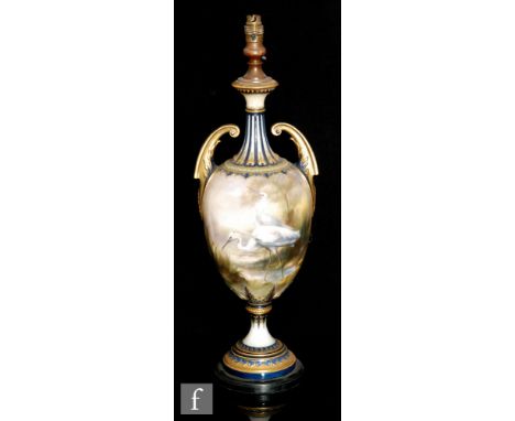 A large late 19th Century Royal Worcester vase decorated by W Powell with hand painted wading birds, the neck and foot with m