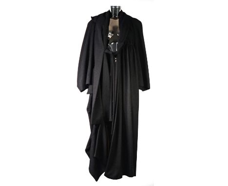 VIVIENNE WESTWOOD: Black full length virgin wool overcoat with gold viscose lining, size 12