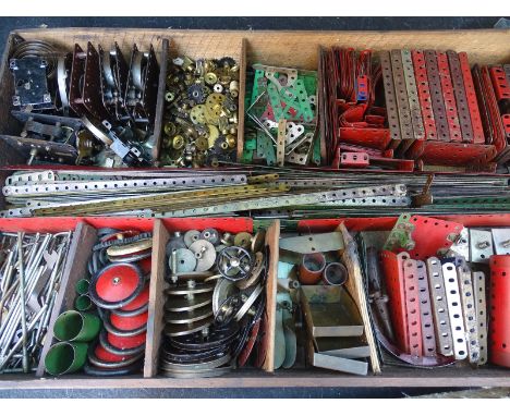LARGE QUANTITY OF VINTAGE MECCANO: to include motors, gears and instruction booklets. Presented in a wooden tray and two boxe