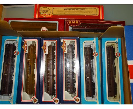 OO GAUGE MODEL RAILWAYS: A GROUP OF SUBURBAN COACHES BY BACHMANN, AIRFIX AND DAPOL - all in maroon livery together with a box