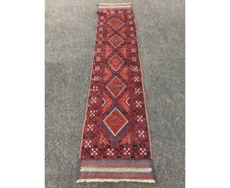 A Meshwani carpet runner 271 cm x 64 cm