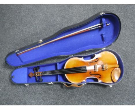 A viola, 16'' back with deluxe case and bow