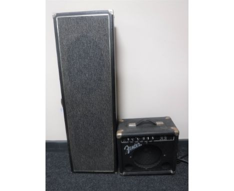 A vintage Fender guitar amplifier together with a vintage practice speaker