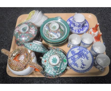 A tray of oriental wares including blue and white coffee cans and saucers, miniature Japanese vases, rice bowls etc