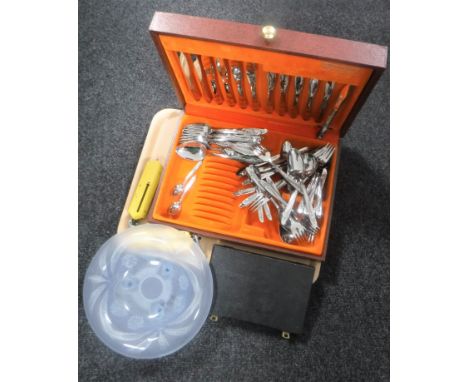 A tray containing cased canteen of Oneida cutlery, opaque etched glass bowl, two sets of pocket balance scales, cased miniatu