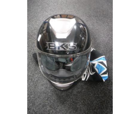 A BKS motorcycle crash helmet in bag