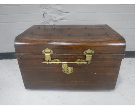 An early 20th century tin trunk 