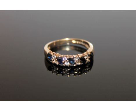 A 9ct gold sapphire and diamond ring, size K, approximately 0.2ct.