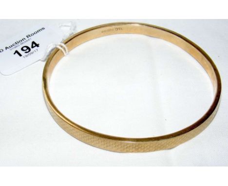 Engine turned 9ct gold bangle