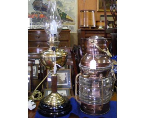 An early ship's brass and copper lamp, together with a Victorian oil lamp