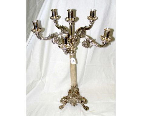 A cast and plated six branch table candelabra with reeded column and Lion's paw tripod supports - 70cm high
