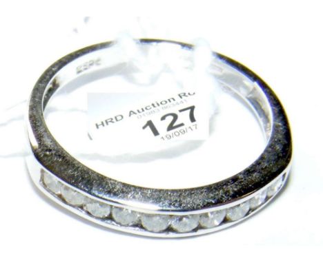 A 9ct white gold diamond half hoop eternity ring