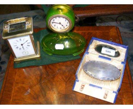 A carriage clock, silver back brush, etc.