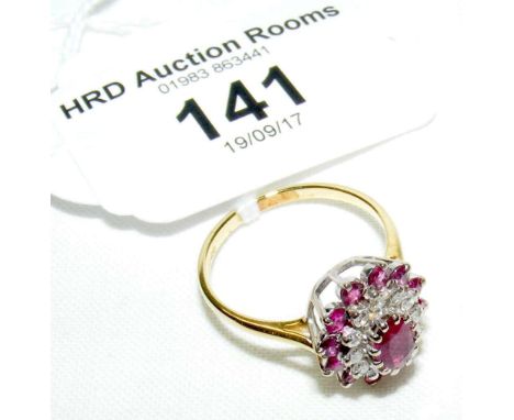 An 18ct yellow gold ruby and diamond cluster ring