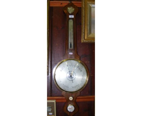 A rosewood cased wheel barometer/thermometer by Spelzini, London