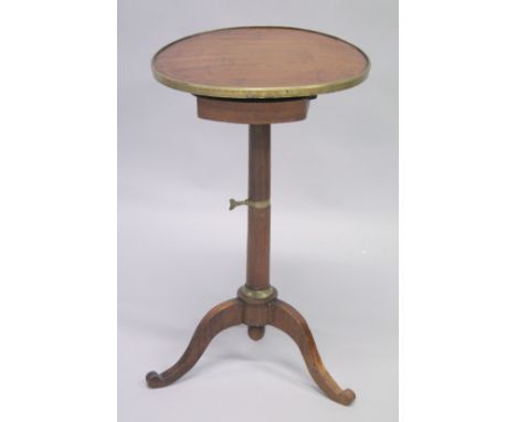 A 19TH CENTURY FRENCH CIRCULAR TOP CAMPAIGN TABLE on tripod base.