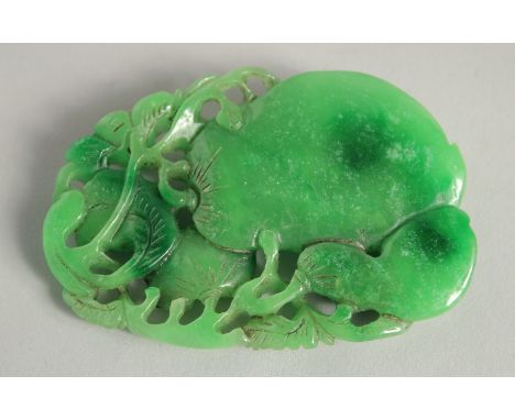 A CHINESE CARVED LARGE JADE PENDANT. 3ins.
