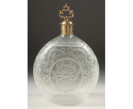 A CONTINENTAL ROUND ETCHED GLASS DECANTER with silver rim and stopper. 7.5ins high.