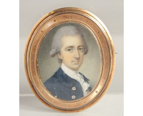 ATTRIBUTED TO JOHN SMART -&nbsp;A SUPERB GEORGE III OVAL PORTRAIT IVORY MINIATURE &nbsp;OF A GENTLEMAN wearing a blue coat, t