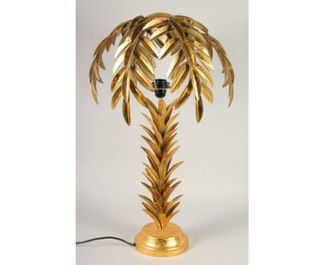A GILT METAL PALM TREE TABLE LAMP. 2ft 4ins high.