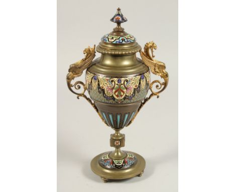 A GOOD 19TH CENTURY FRENCH CHAMPLEVE ENAMEL TWO HANDLED BRONZE URN AND COVER with winged eagle handles. 12ins high.