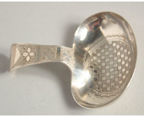 A GEORGE III SILVER ENGRAVED CADDY SPOON. Birmingham 1809.