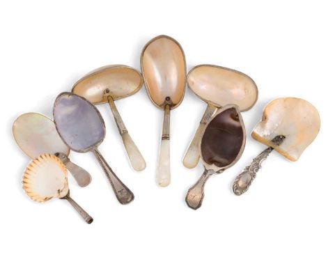 A collection of eight assorted shell caddy spoons, comprising: a silver-mounted one by Matthew Linwood, reeded handle, shell 