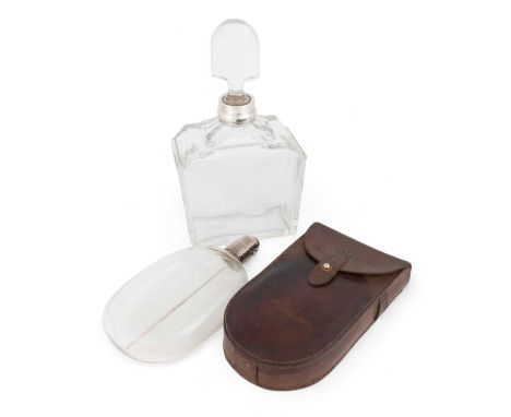 A Victorian silver-mounted glass hunting flask,by Thomas Johnson II, London 1883,oval glass body, a screw-off mounted cover w