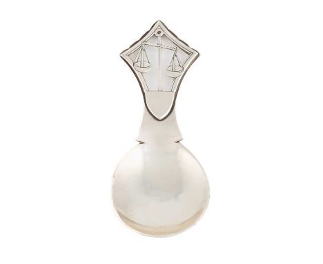 By H. G. Murphy, an Arts and Crafts silver caddy spoon, London 1938, also marked with the falcon mark, the handle pierced wit