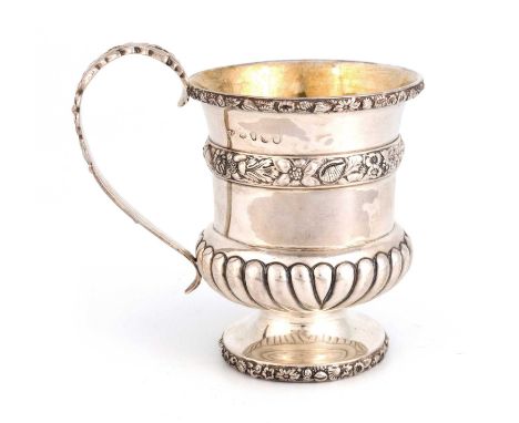 A George III silver mug, by Paul Storr, London 1819. baluster form with part-fluted decoration, the girdle and rims decorated