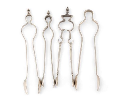 A collection of four pairs of early-18th century sugar tongs, apparently unmarked, andiron form, one with baluster arms and a