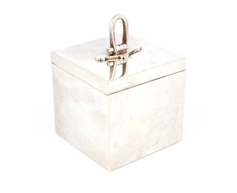 A heavy silver tea caddy/box, by William Comyns, London 1913, plain cube form, the hinged cover with a hinged finial, the cov