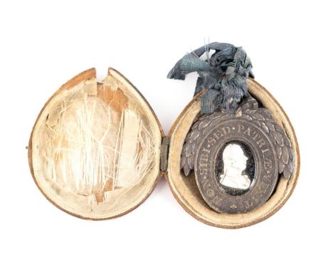 A Pitt Club medal,William Tassie, circa 1806,shaped oval form surmounted by a wreath with a ring attachment, a central white 