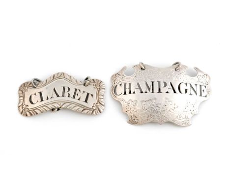 A George II silver wine label, by Sandilands Drinkwater, London circa 1740, escutcheon form with engraved foliate decoration,