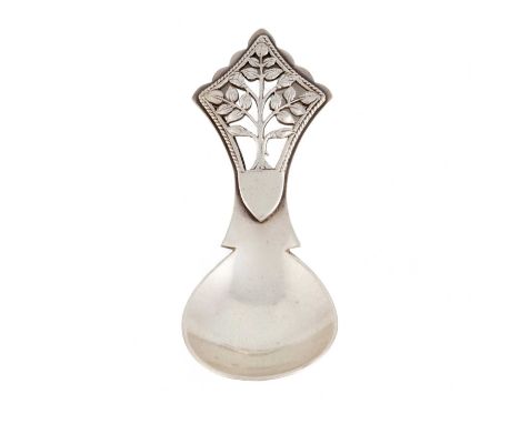 By H. G. Murphy, An Arts and Crafts silver Tree of Life Caddy spoon, London 1934, also with the falcon mark, pierced tree han