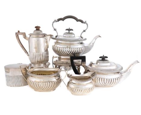 A matched six-piece silver and electroplated tea set,part-fluted decoration, comprising: an oblong teapot, cream jug and suga