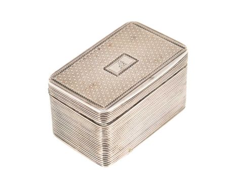 A George IV silver nutmeg grater,by William Evans, London 1825,rectangular form, reeded sides, hinged engine-turned cover and
