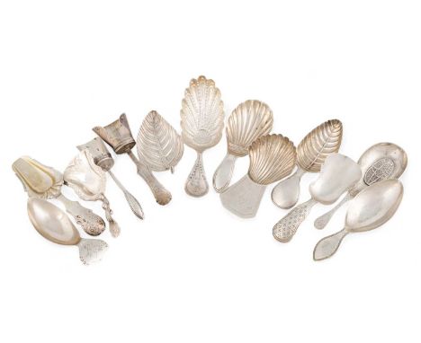 A collection of thirteen Dutch silver caddy spoons,  various designs dates and makers, including one of leaf form, one with a