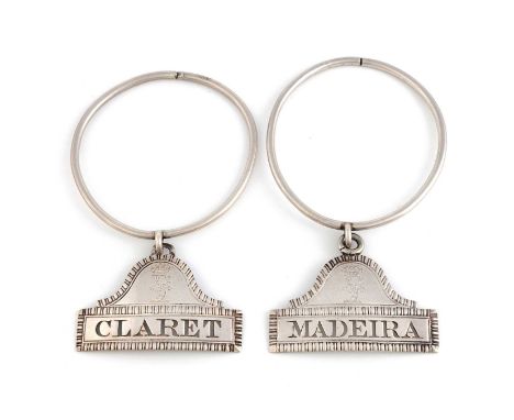 A pair of George III silver neck ring wine labels, by Thomas Phipps, Edward Robinson & James Phipps, London 1811, shaped rect