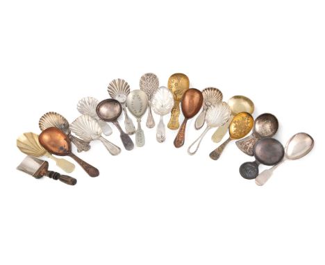 A collection of electroplated and base metal caddy spoons, various designs and makers, including an Arts and Crafts one and o