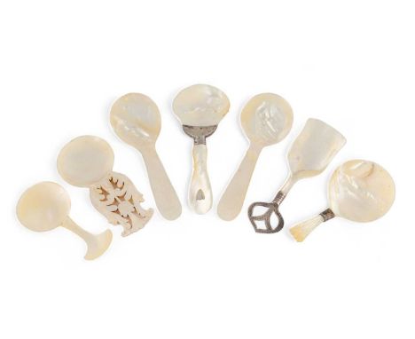 A collection of 19th century mother-of-pearl caddy spoons, various designs including two Chinese ones, engraved with figures 