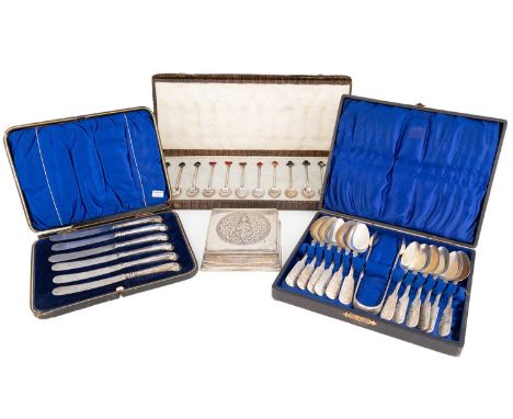 A mixed lot of silver items,comprising: a set of twelve silver and enamel spoons, the terminals with an enamel playing card s
