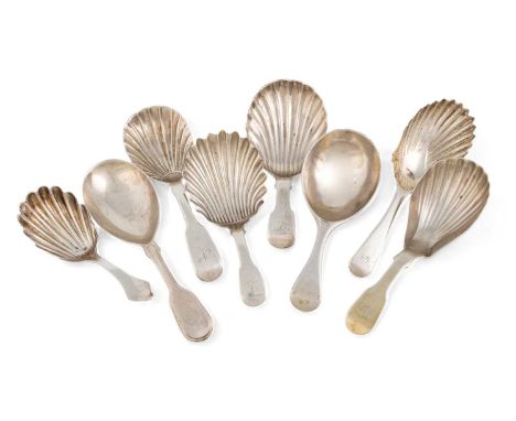 A collection of eight silver caddy spoons, Colonial and unascribed provincial, shell bowls, approx. weight 4oz. (8)Provenance