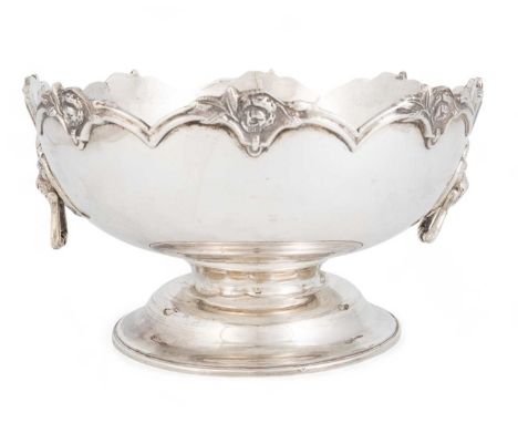 An Egyptian silver Monteith bowl,Cairo, .900 standard, probably 1980's,circular form, lion mask drop-ring handles, castellate