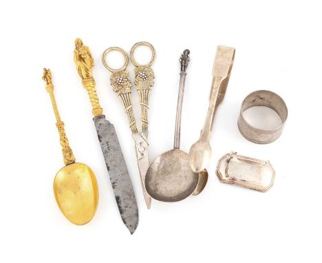 A mixed lot of silver flatware,comprising: a pair of George III silver-gilt grape scissors, by Eley, Fearn and Chawner, Londo