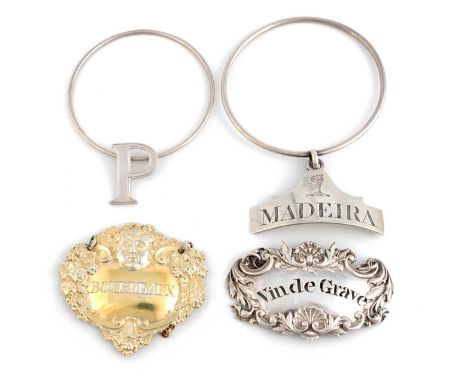 A small collection of antique silver wine labels, comprising: a silver-gilt one by Digby Scott & Benjamin Smith, London 1804,